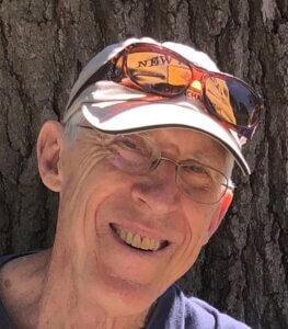 Headshot of Dutton Foster against a tree