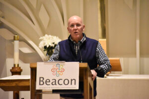 Charlie Flynn speaking at the convening