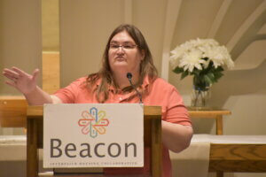 Theresa Dolata speaking at the congregation convening