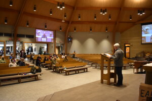 Tom Olson looking out at the audience during the congregation convening