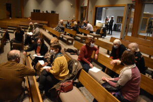 Individuals talking to each other at a church