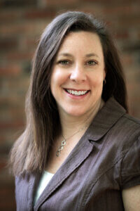 Sarah Koschinska, the Senior Director of Resident Services at Project for Pride in Living (PPL)