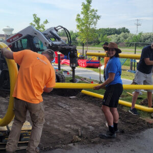Team of volunteers constructing playground